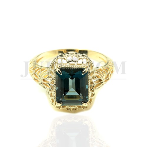 Złoty pierścionek w stylu wiktoriańskim z Topaz London Blue