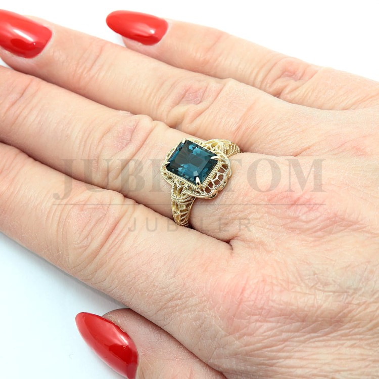 Złoty pierścionek w stylu wiktoriańskim z Topaz London Blue