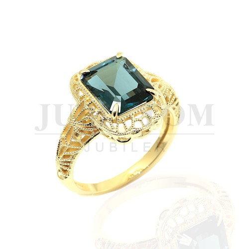 Złoty pierścionek w stylu wiktoriańskim z Topaz London Blue