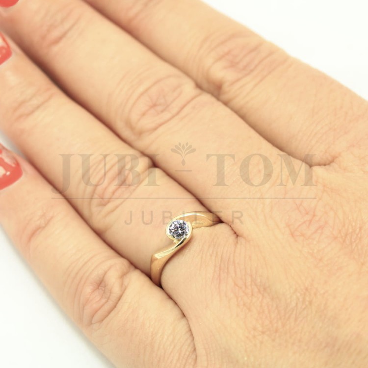 Złoty pierscionek z brylantem 0,23ct SI/G/H