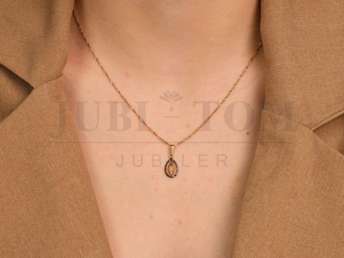 Złota zawieszka Migdał z  czarnymi cyrkoniami p.585